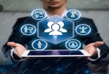 Man with an ipad, trying to choose best staffing solution